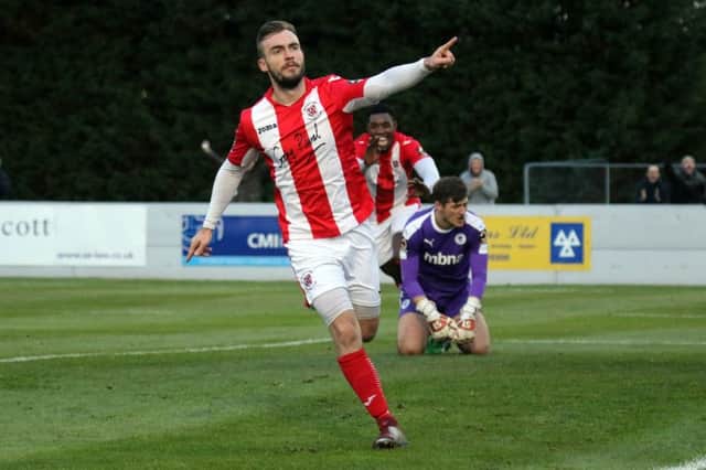 Shane Byrne celebrates after putting Brackley Town back in front against Chester. Photo: Steve Prouse