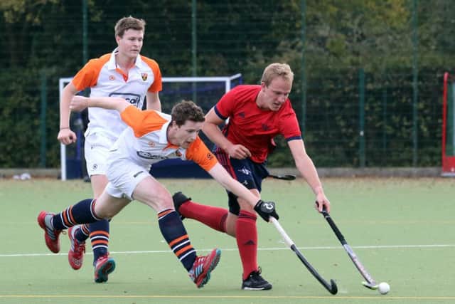 Banbury's Jonny Stirrup goes on the attack against Old Cranleighans