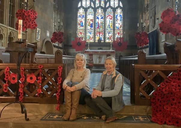 Tysoe WI members Dee Spencer and Christine Harrop with some of the poppies on display at St Marys Church NNL-180711-102055001