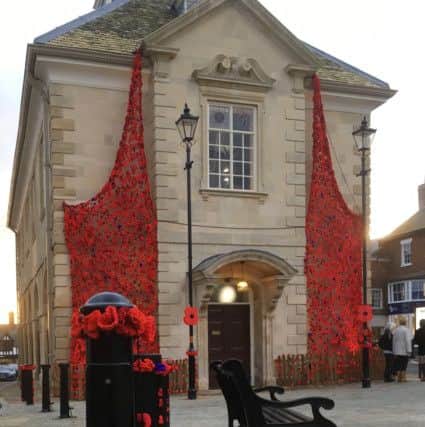 Brackley Town Hall has been decorated with cascades of poppies for the Armistice centenary NNL-180711-141442001