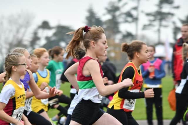 Banbury Harrier Tilly Lainchbury on her way to fourth place in the under-13 girls race
