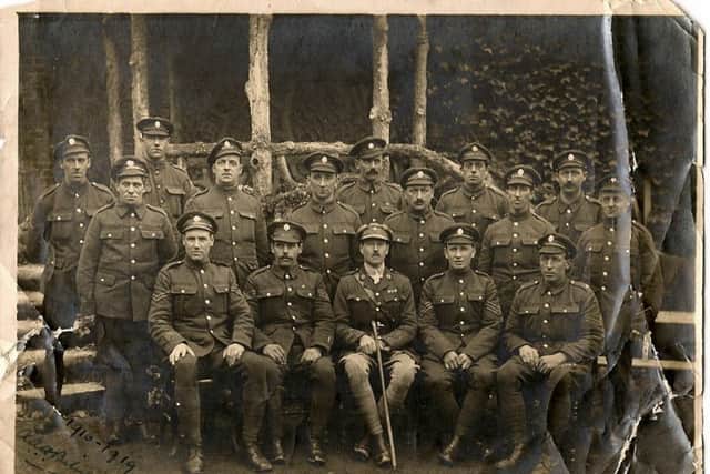 Sgt Sidney Woodcock is sat on the front row immediately to the left of the officer, sporting a moustache. Photo: Steve Woodcock NNL-180811-094443001