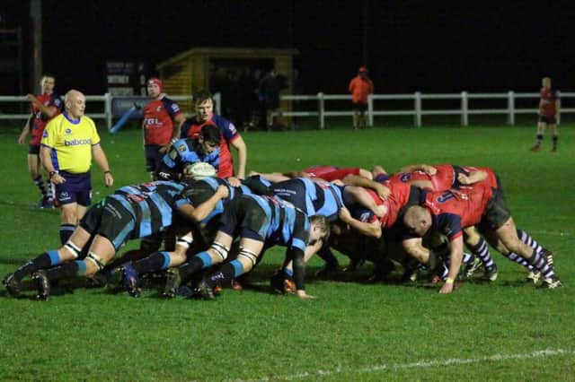Banbury Bulls face their Witney counterparts in a scrum during Friday's Oxon County Cup tie. Photo: Simon Grieve