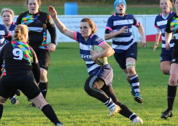 Keeli Wood on her way to scoring one of her six tries for Banbury Belles. Photo: Simon Grieve