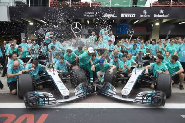 The Mercedes AMG Petronas team celebrate another title in Brazil