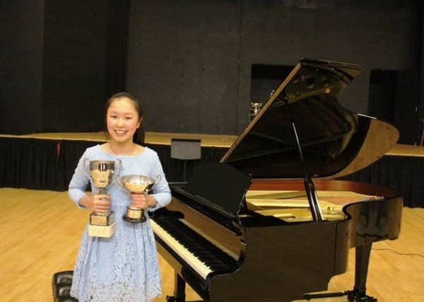 Banbury Young Junior Musician of the Year 2018  Amelie Chen with trophies
