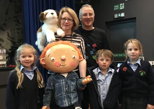 Authors Adam and Charlotte Guillain with George visit Sibforb School NNL-181119-150832001