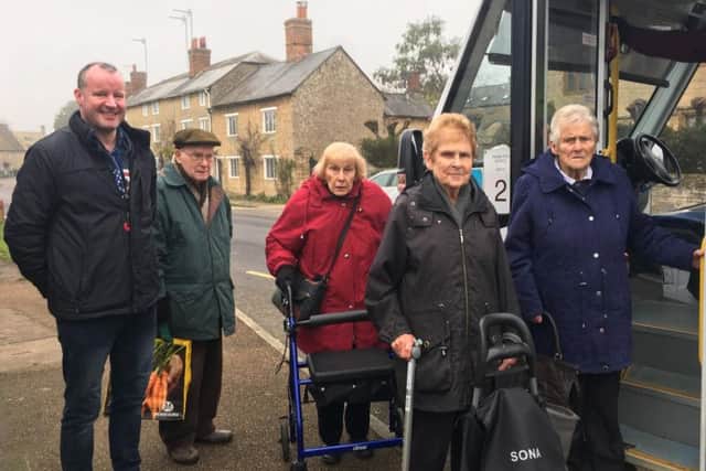 Shopping bus passengers with Aynho Parish Council clerk Chris Wilson in Aynho