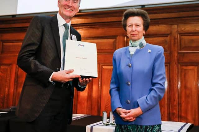 Andrew Rimmer receives his RYA outstanding contribution award from the Princess Royal. Photo: Paul Wyeth/RYA