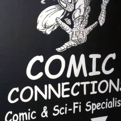Comic Connections in Parsons Street. NNL-140423-143227001
