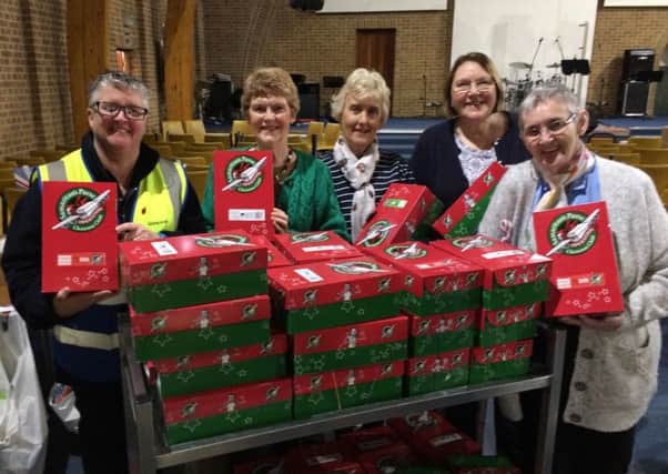 (L-R) Caroline Arrow from DHL Banbury, Operation Christmas Child Banbury area coordinator Eunice Harradine and volunteers Yvonne Penny, Lynda Page and Angela Mitchell in The Peoples Church, which becomes a busy processing centre for three weeks in November NNL-181217-145350001
