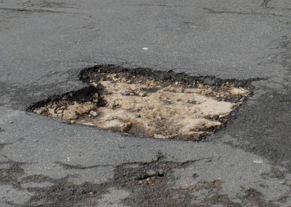 Banbury street potholes. Mewburn Road. NNL-180503-123017009