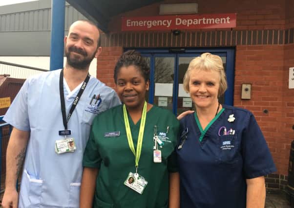 (L-R) Nursing assistant Alessio Deales, nursing practitioners Charline Ngandwe and Valerie Bissett from the emergency department NNL-181220-121554001