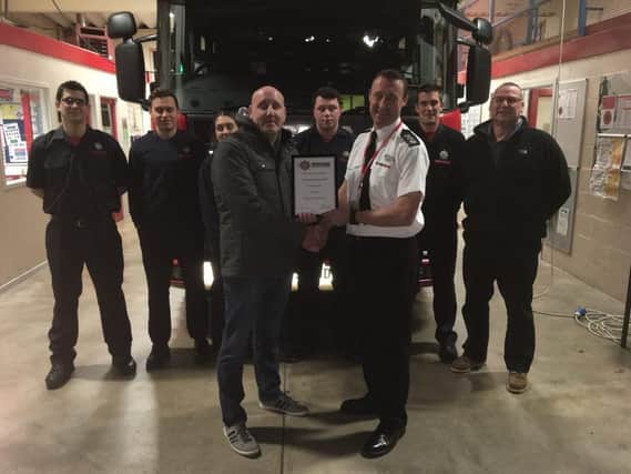 Jason Hall gets a warm farewell from his colleagues at Warwickshire Fire and Rescue Service