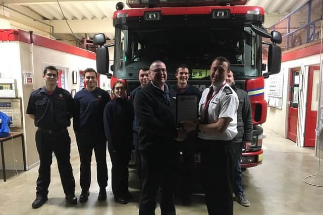 Michael Jones gets a warm farewell from his colleagues at Warwickshire Fire and Rescue Service