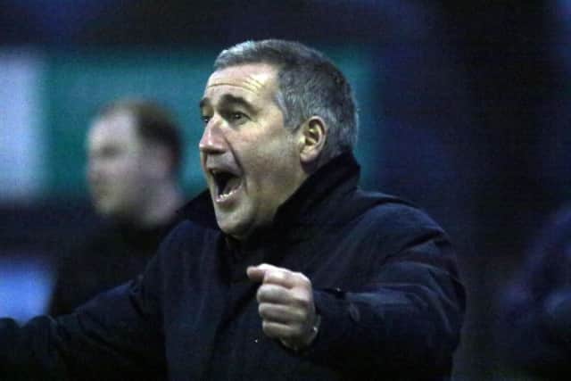 Banbury United manager Mike Ford celebrates another goal against Barwell. Photo: Steve Prouse
