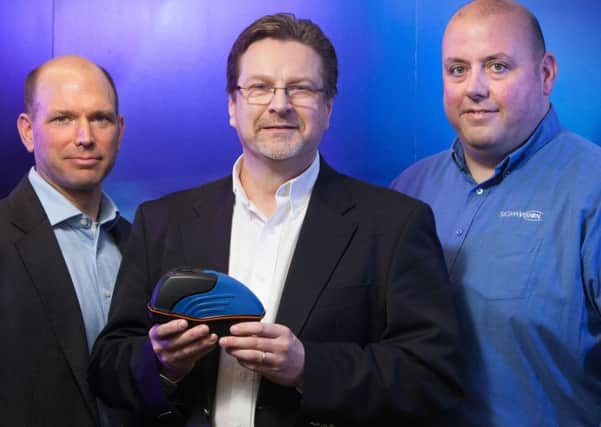 From left, Bill Yost of Mercia, Sigmavisions managing director Andrew Pryce and sales director Chris Coyle.