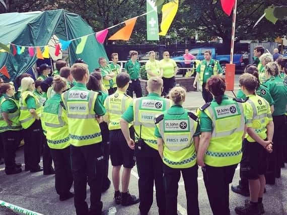 St John Ambulance volunteers are briefed at an event. Photo: St John Ambulance