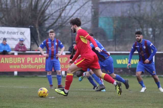Giorgio Rasulo gives Banbury United the lead from the penalty spot against Coalville Town. Photo: Steve Prouse