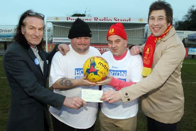 Banbury United FC Commercial Director Mark Allitt hands a cheque to Keep the Horton General chairman Keith Strangwood with Kevin Preedy and Ken Hopkins NNL-190120-100729009