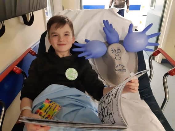 Milosz Trytko with his special Horton birthday gifts, made by inventive staff in the children's ward