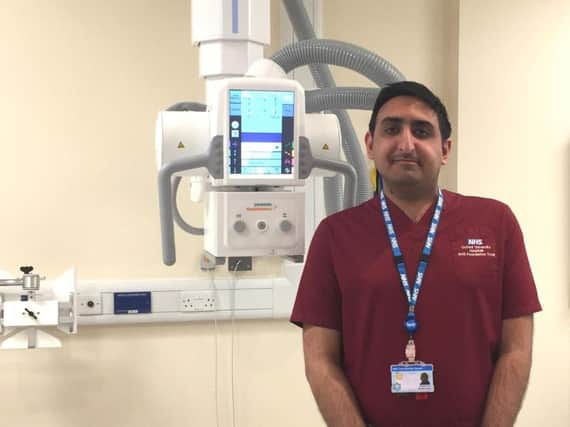 Radiographer Beyant Kular with the new X-ray machine at the Horton General Hospital. Photo: OUH NHS Foundation Trust