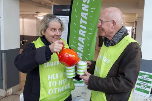 Banbury and District Samaritans outreach coordinator Davina Birkbeck and director Will Adams practice what they preach by sharing a pot of tea NNL-190122-105445001