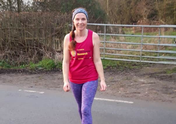 Vicki Salmon will be running the London Marathon for brain tumour research NNL-190128-112812001