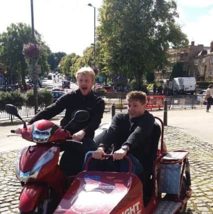 Matt Bishop and Reece Gilkes will attempt to circumnavigate the globe in a scooter sidecar combination NNL-170915-091737001