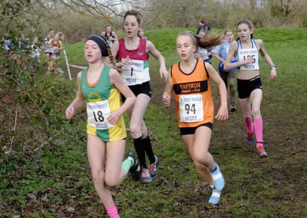 Tilly Lainchbury on her way to sixth place in the Midland Cross Country Championships