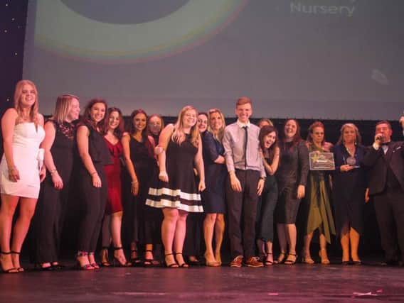 The Banbury School Day Nursery team accept their award at the National Nursery Recognition Awards. Photo: Recognise Media