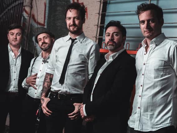 Frank Turner and his band The Sleeping Souls