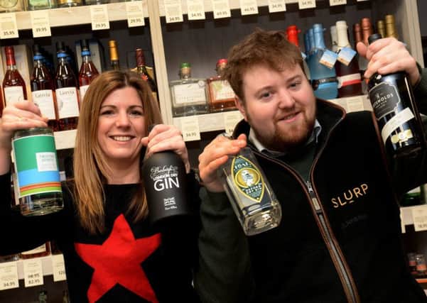 Hannah Lovell and Freddie Ricardo from Slurp Banbury with some of their gins. NNL-190502-113504009