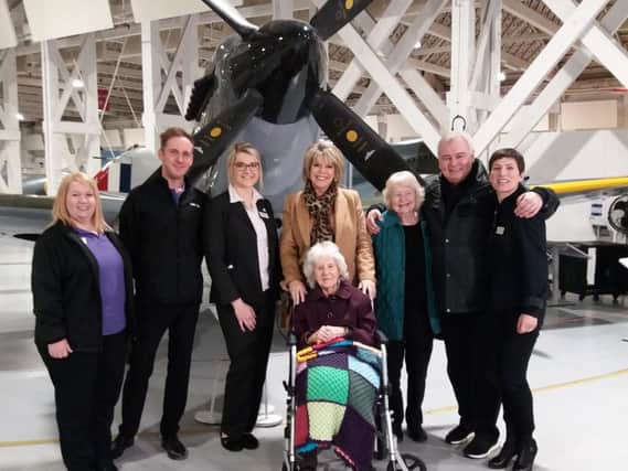 Violet Mitchell (centre) with Ruth Langsford, Eamonn Holmes, her sister, the team from Highmarket House and the museum