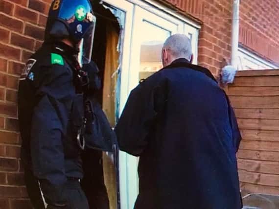 Police raid a property in Padbury Drive, Banbury. Photo: Thames Valley Police/Twitter