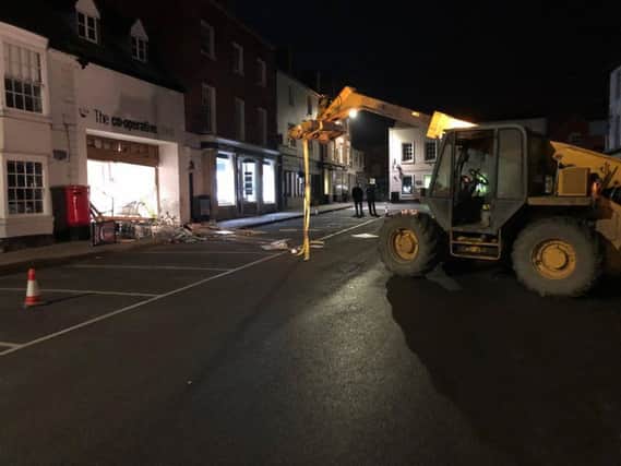 The digger was used to smash through the Co-op in Shipston and was left at the scene. Photo: Warwickshire Police