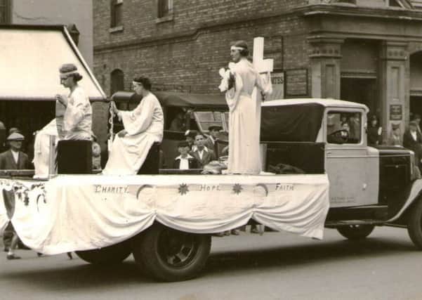 The Workpeoples Association float in the 1937 Hospital Carnival Fete procession Faith, Hope and Charity NNL-190225-113305001