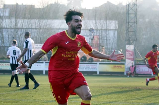Banbury United top scorer Ravi Shamsi celebrates after reducing the arrears against St Ives Town. Photo: Steve Prouse