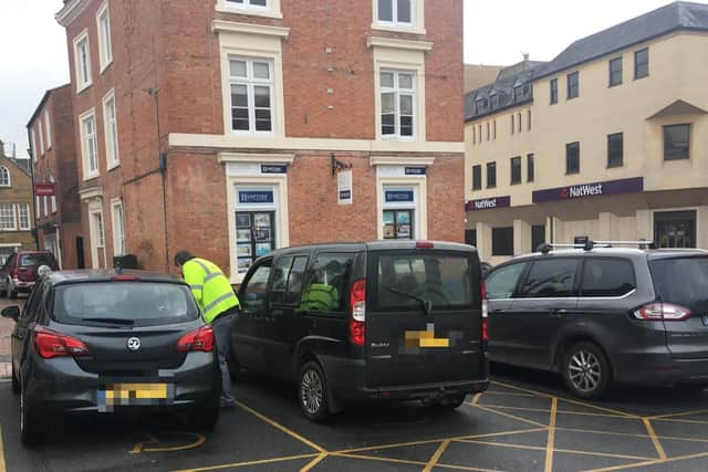 Senior investigations officer Ben Simmons politely asks a disabled bay user to show him their Blue Badge - like most people, their's was valid