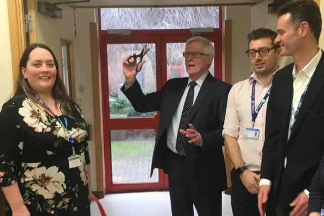 John Craven cuts the ribbon at the Horton General Hospital's new integrated services hub with (L-R) Kathy Hall, director of strategy, head of therapies Terry Cordrey and director of improvement John Drew
