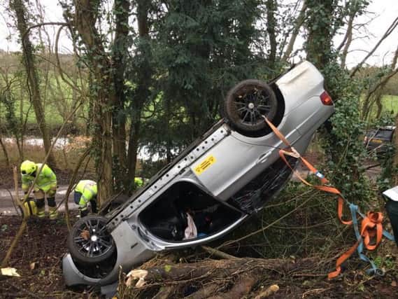 Firefighters had to cut the door off the car to rescue the injured man. Photo: Oxfordshire Fire and Rescue Service