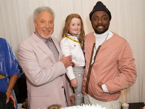 Anna, 7, from Chipping Norton with Sir Tom Jones and Will.I.Am from the Voice