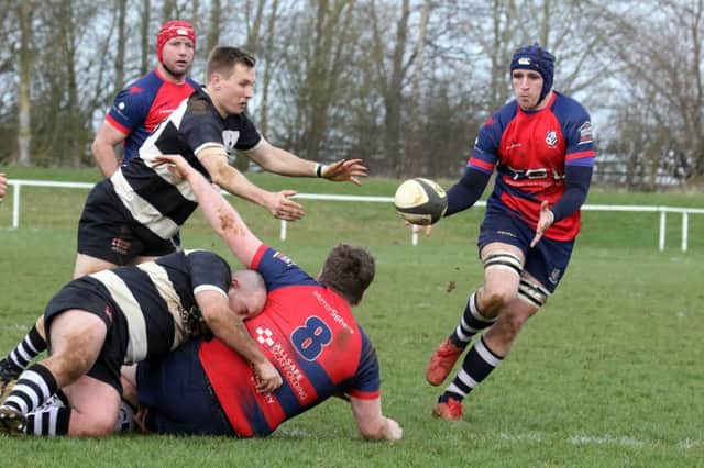 Banbury Bulls' Jacob Mills receives a pass from Callum Horne against Stratford Upon Avon at the DCS Stadium. Photo: Steve Prouse