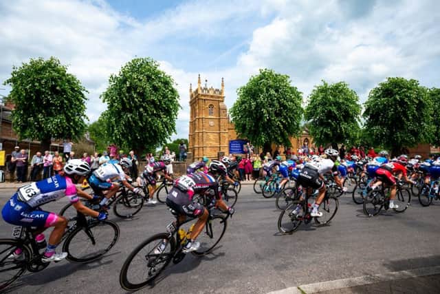 The Women's Tour zooms past St Peter's Church in Kineton. Picture by SWpix.com NNL-180618-101032001