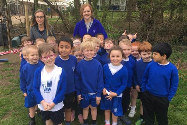 Sharon Darke and foundation stage teacher Emily Whitmarsh with Hill View Primary School pupils ready to run