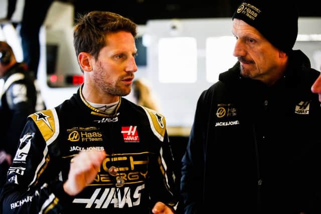 Rich Energy Haas F1 driver Romain Grosjean and team boss Guenther Steiner. Photo: Andy Horne