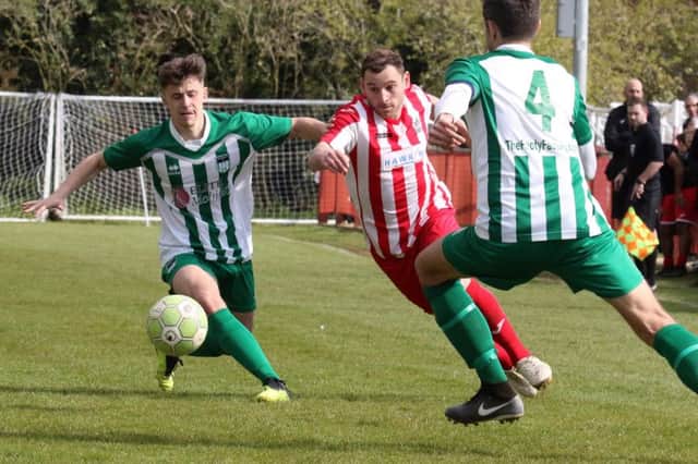 Joe Coleman goes on the attack for Easington Sports against Almondsbury. Photo: Steve Prouse