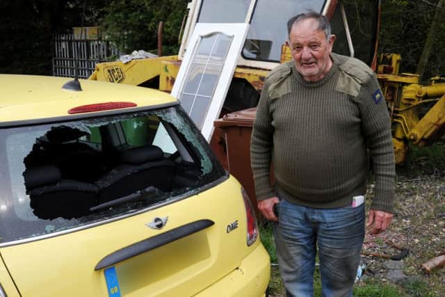 Bill with the Mini One which had its back window smashed