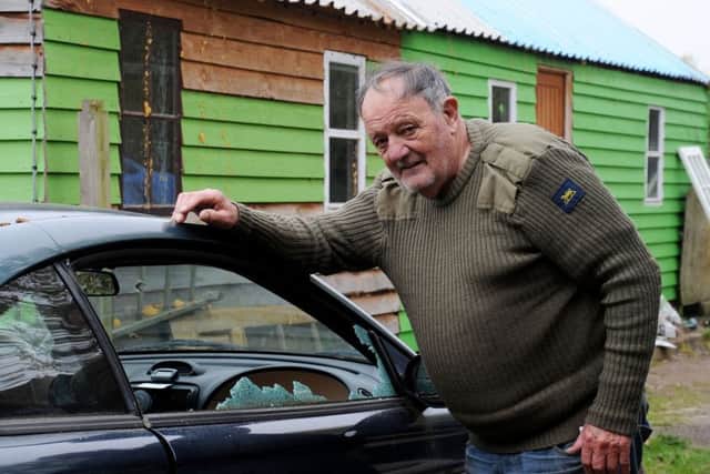 Bill Carpenter with the Ford Mustang which was vandalised during the burglary at his smallholding outside Brackley
