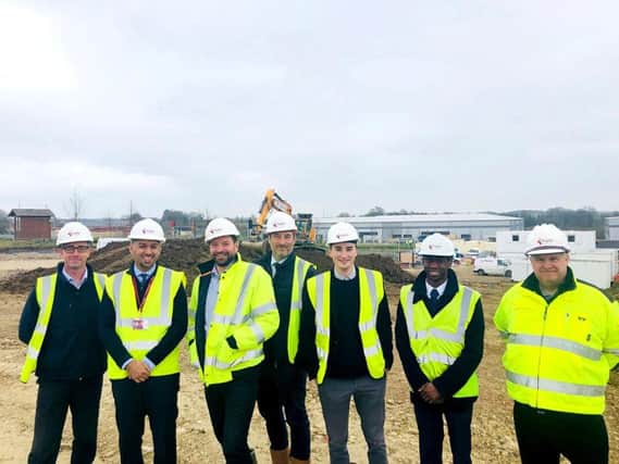 Kingsley Healthcare Group chief investment officer Muj Malik, second left, and investment analyst Leslie Amanquah, second right, with the care home developers on site in Brackley. Photo: Kingsley Healthcare Group